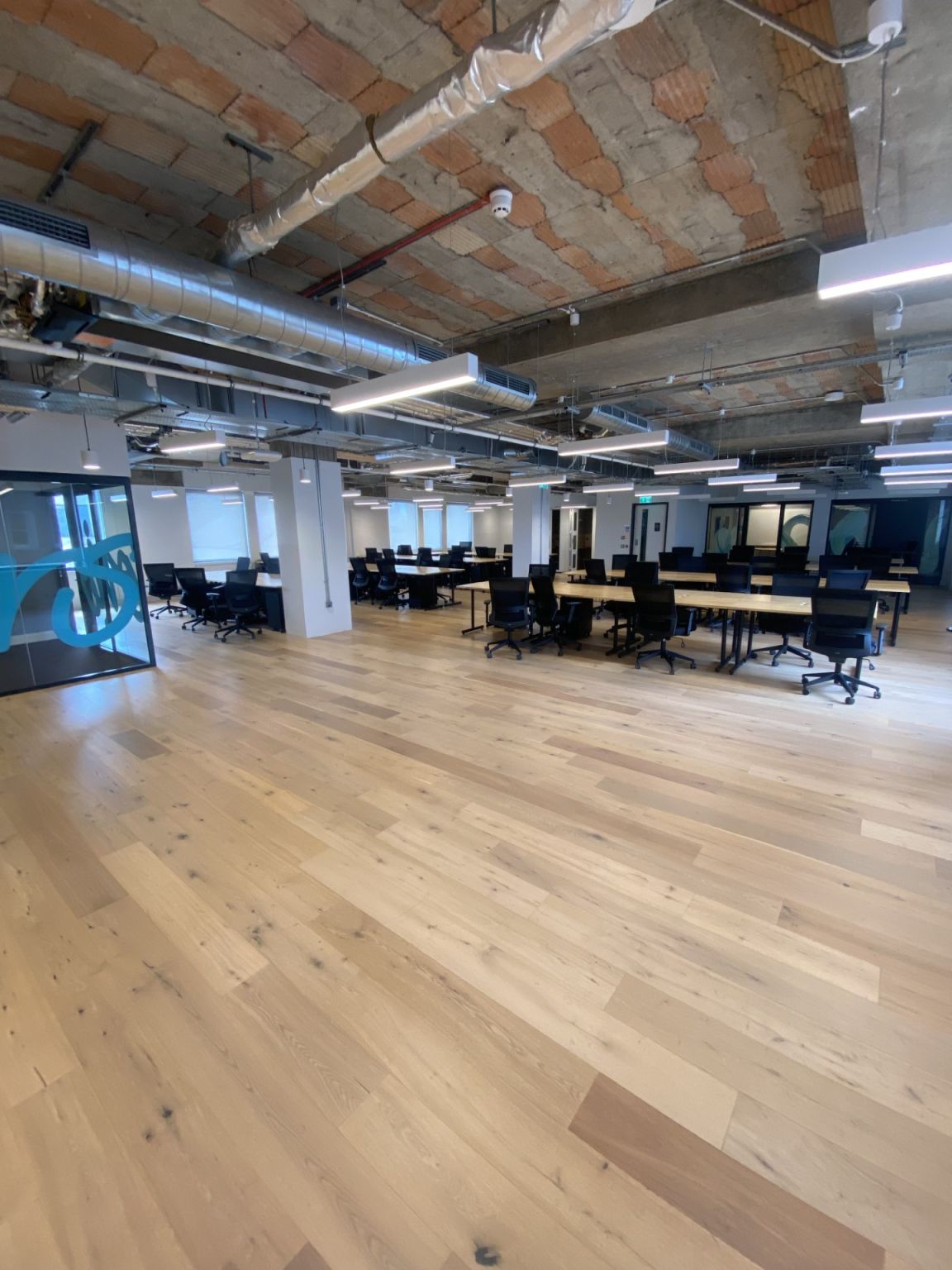 Interior survey work at Long Acre commercial property showing inspection access