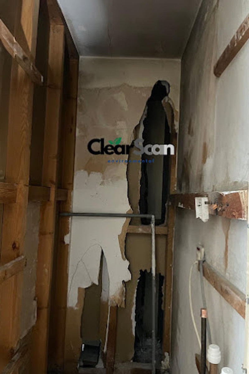 Small interior room in education building with historic fixtures typical of school estate requiring asbestos inspection